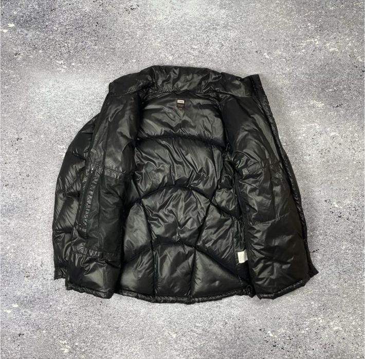 Жіночий пуховик.