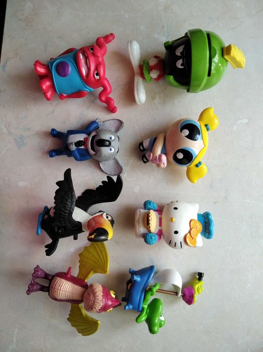 Іграшки герої мультфільмів.хеппі міл