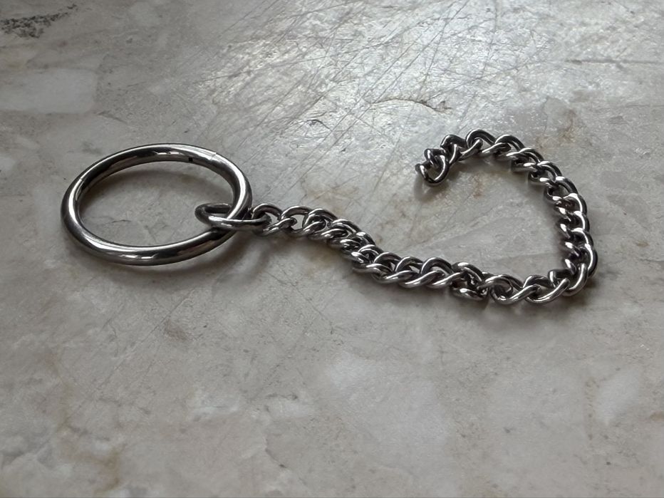 Unisex kolczyk 10 mm piercing 16 G kółko segment Tytan