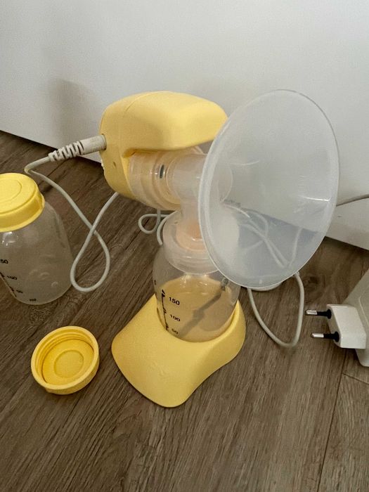 Extrator de leite MEDELA mini eletric com vários acessórios