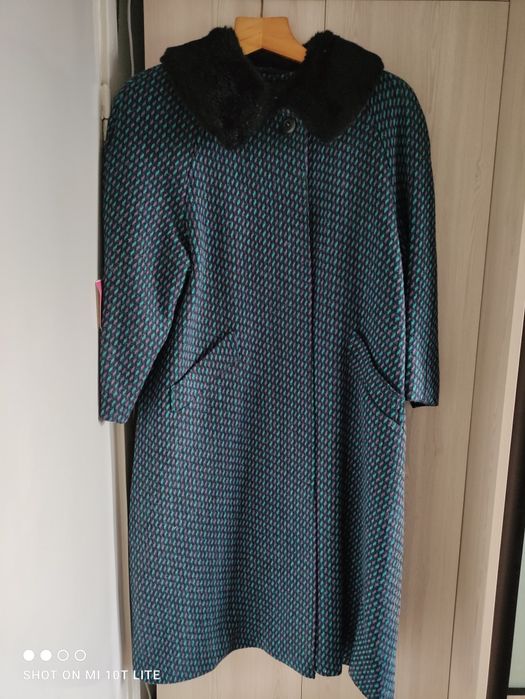 Новое зимнее пальто с этикеткой