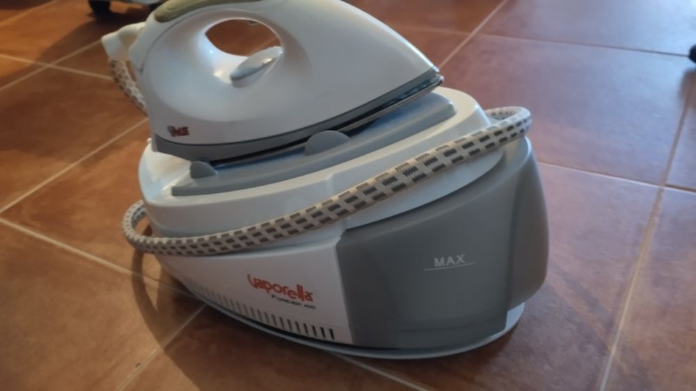 Ferro com caldeira da vaporela