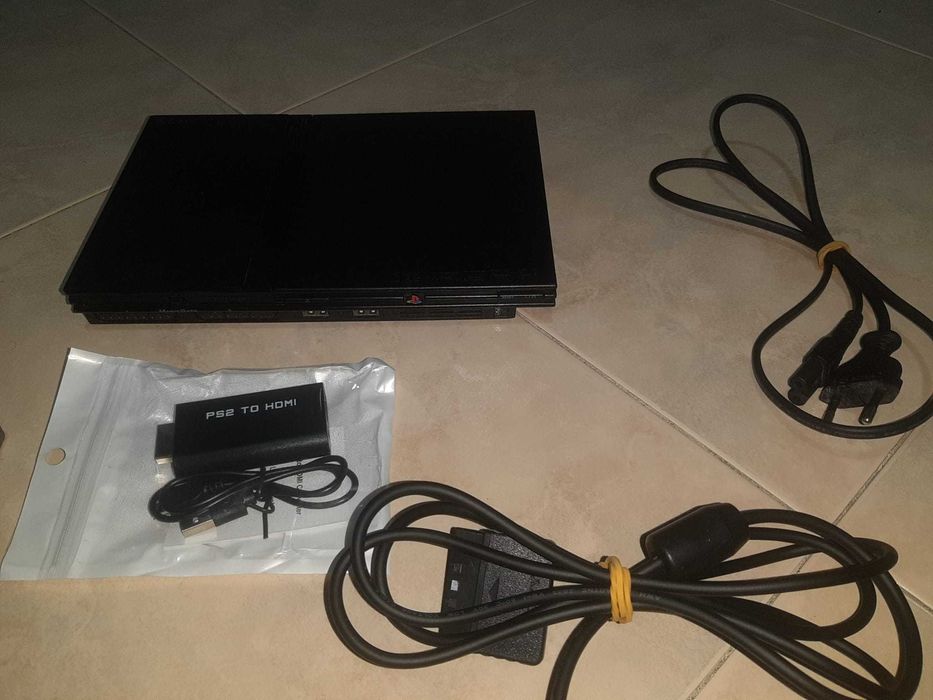 PS2 com 1 comando e 1 jogo GTA