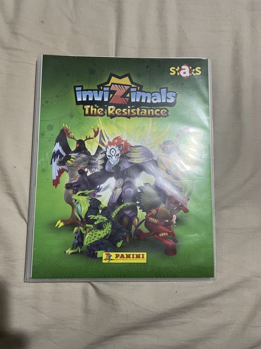 Caderneta praticamente completa de himans dos invizimals