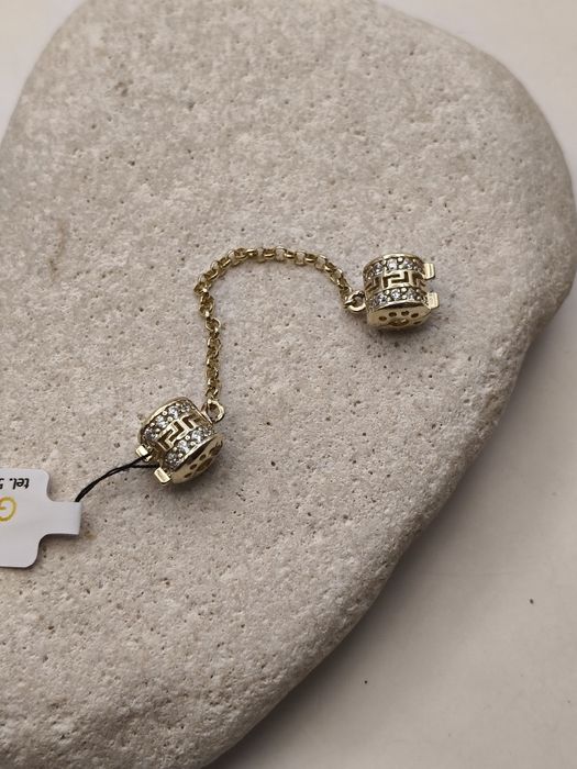 Charms zabezpieczający do bransoletki modułowej