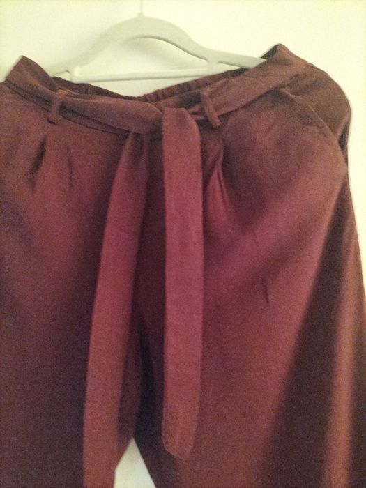 Letnie spodnie na gumce marki Carry rozmiar XS stan bardzo dobry.