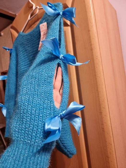 Nowy elegancki swetr