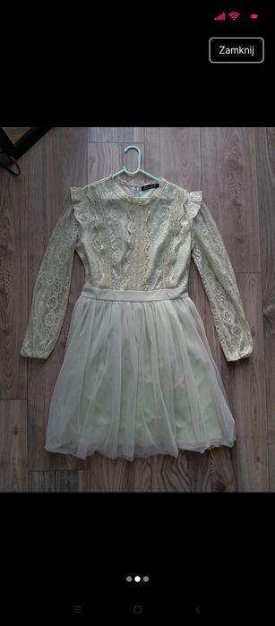 Pastelowa elegancka sukienka