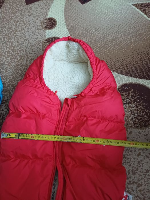 Конверт на Виписку!Продам два  зимових конверти в коляску на овчині.