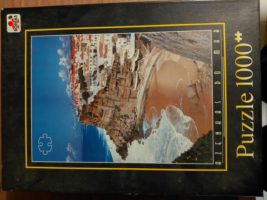 Caixa com 18 puzzles