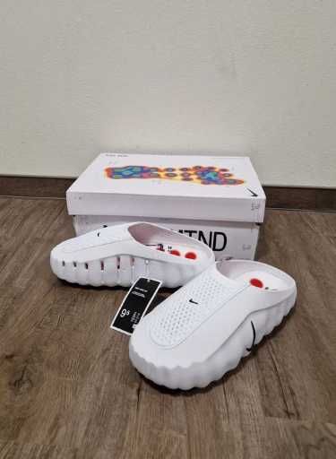 Szare, zakryte kapcie Nike.36