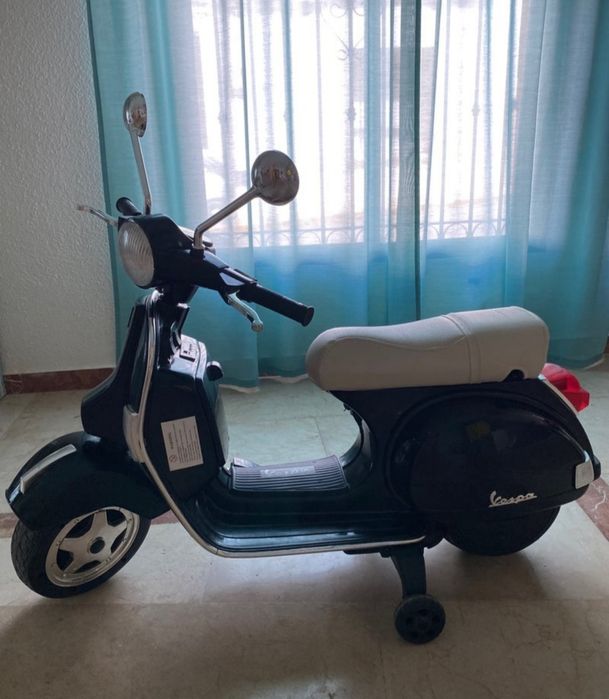 Vespa eletrica criança.