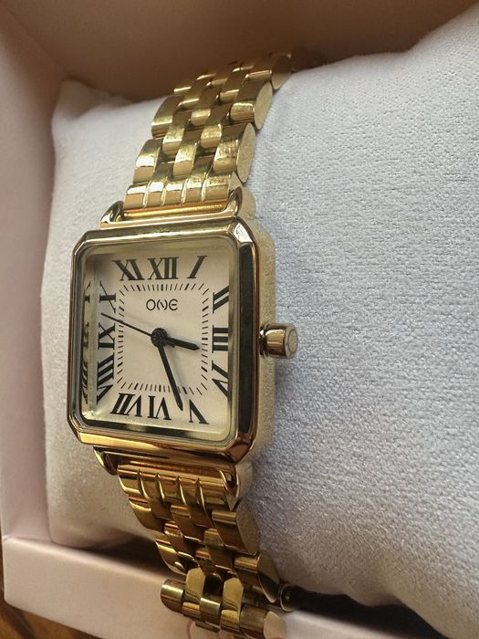 Relógio dourado ONE
