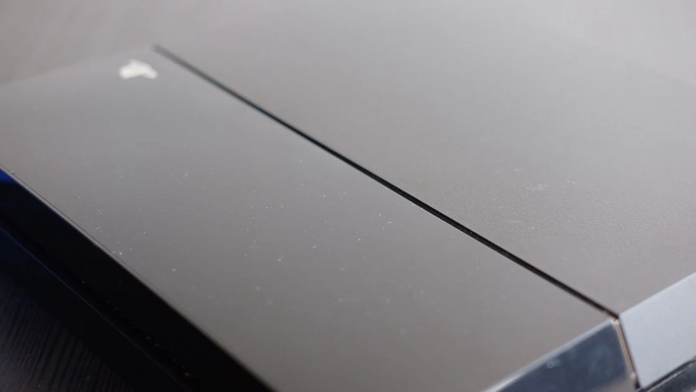 Playstation 4 com 6 Jogos e Comando