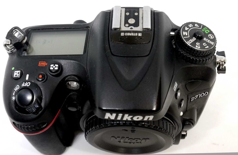 Maquina nikon d710064584485369857123