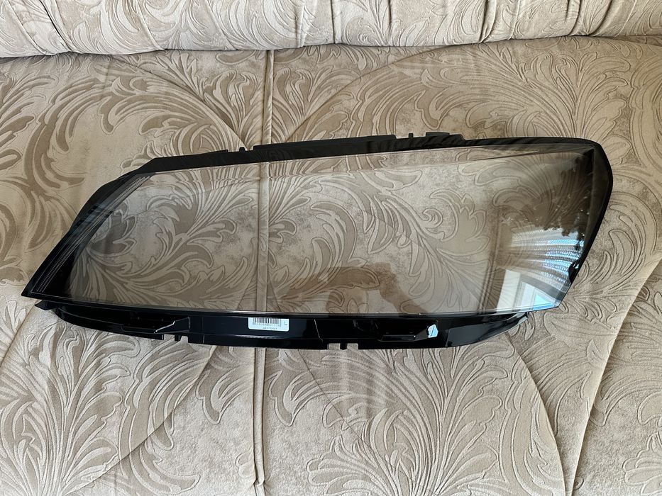 Скло на фару Passat NMS