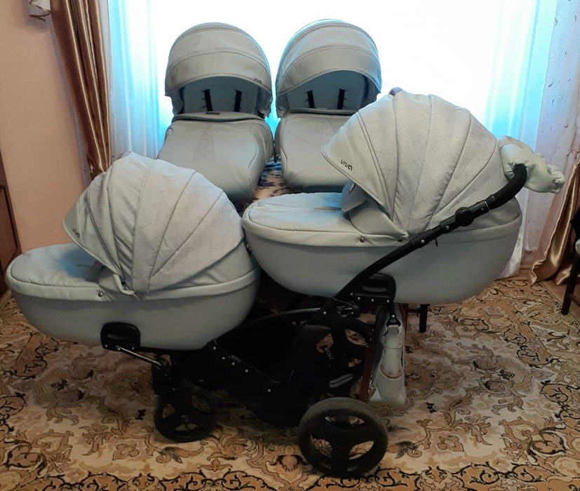 Універсальна коляска для двійнят Tako