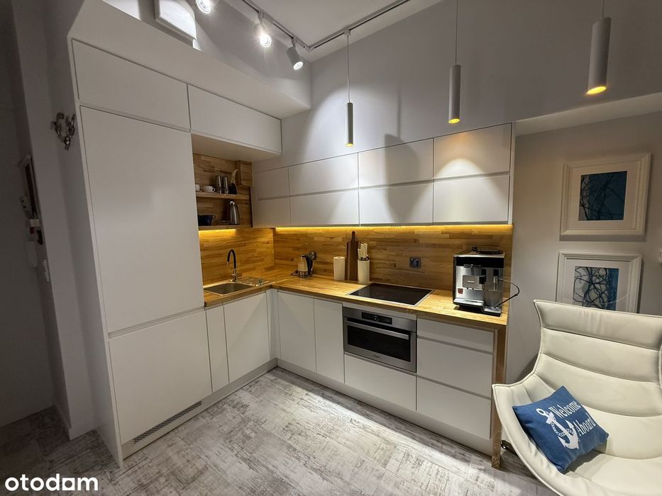 Apartament mieszkalny z balkonem i miejscem parkingowym.