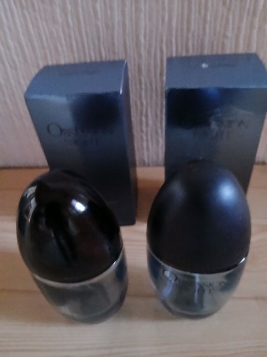 Flakony i pudełka po perfumach Obsession night Cevin Klein.