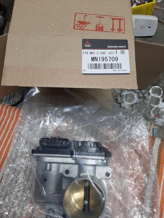 дроссельная заслонка Mitsubishi Lancer 10