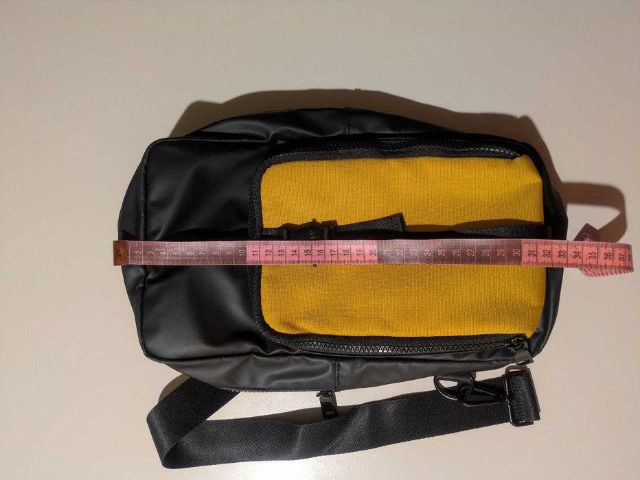 Męska saszetka nerka torba Reserved przez ramię