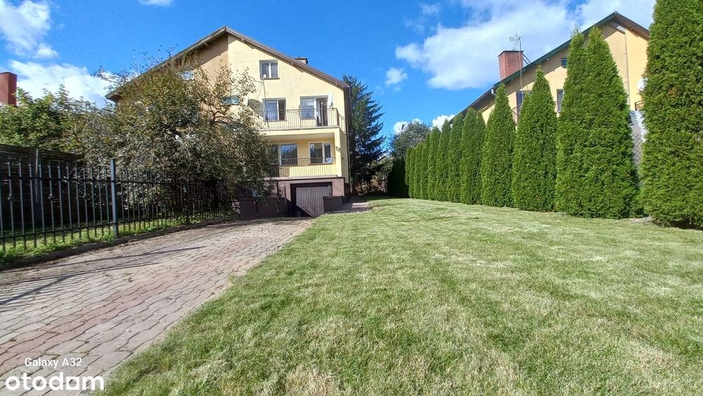 Dom z garażem, ogrodem i poddaszem