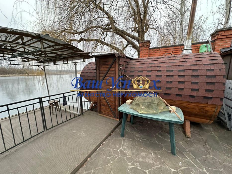 Продаж дома с выходом на реку Конча-Заспа ,дамба . село Козин