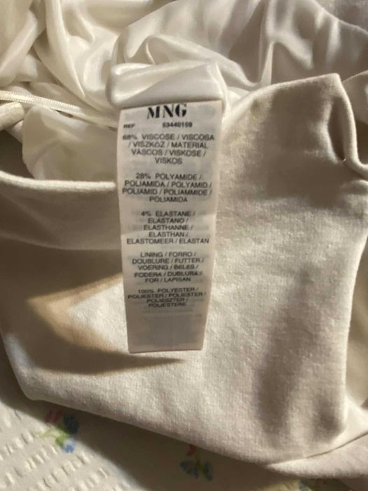 Biała sukienka z Mango rozmiar L.