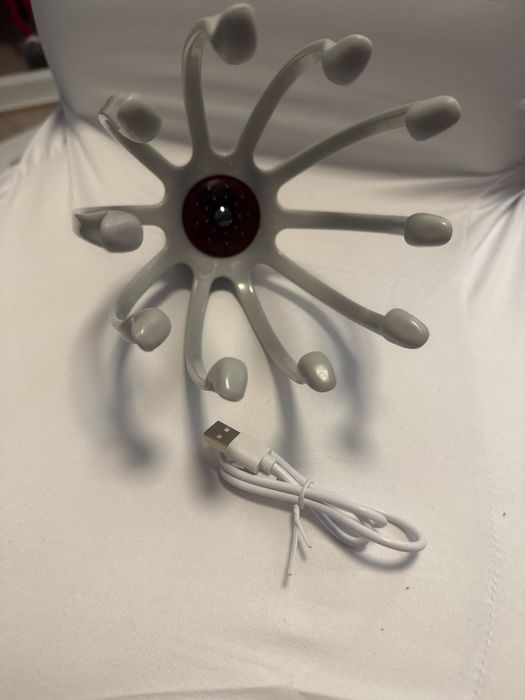 Elektryczny masażer do głowy