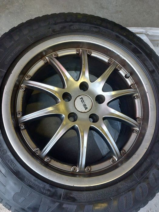TOORA 4x  Felgi aluminiowe 17" + 4x opony letnie Goodyear