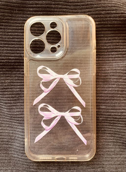 прозорий чохол для iPhone 12 Pro з рожевими бантиками.