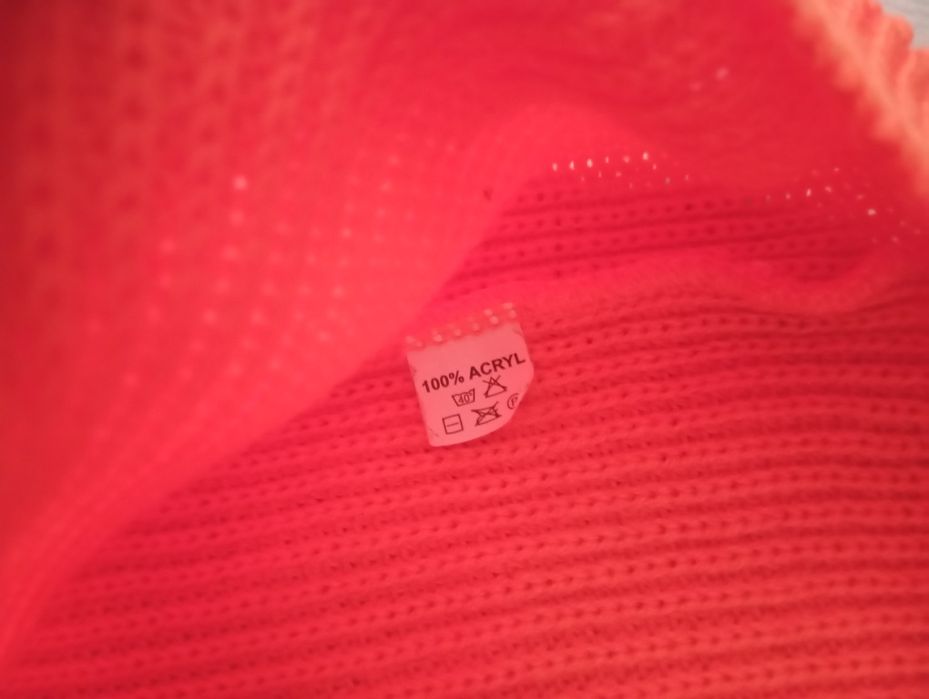 Neonowo pomarańczowy zapinany sweter