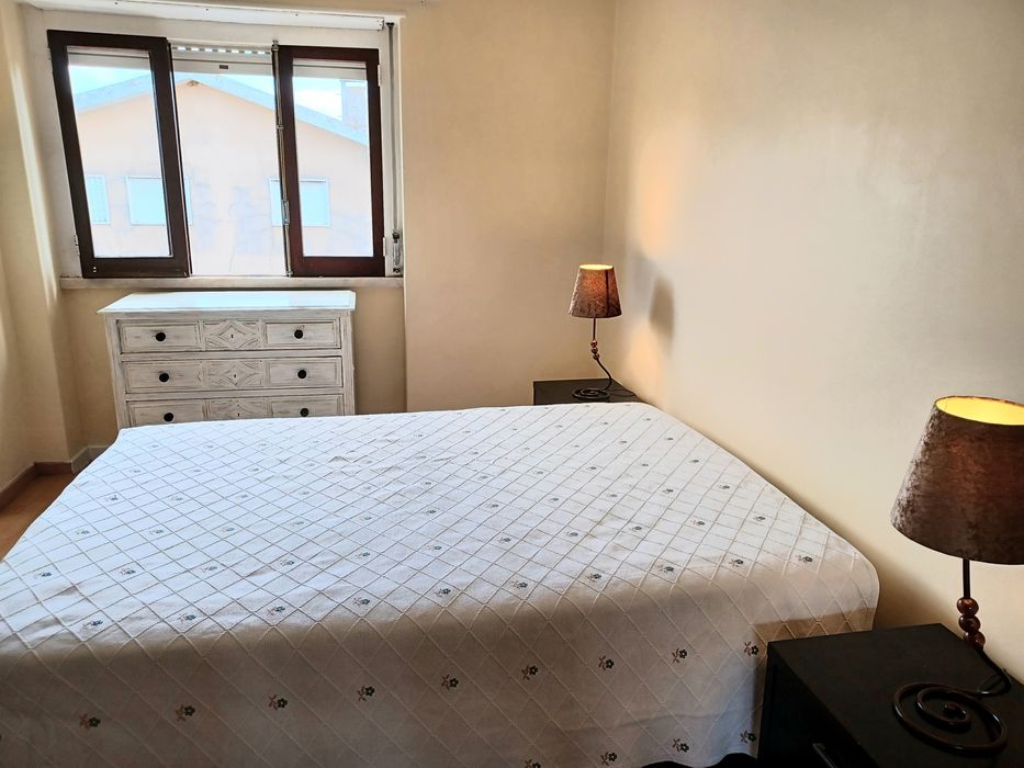 Quarto com cama de casal