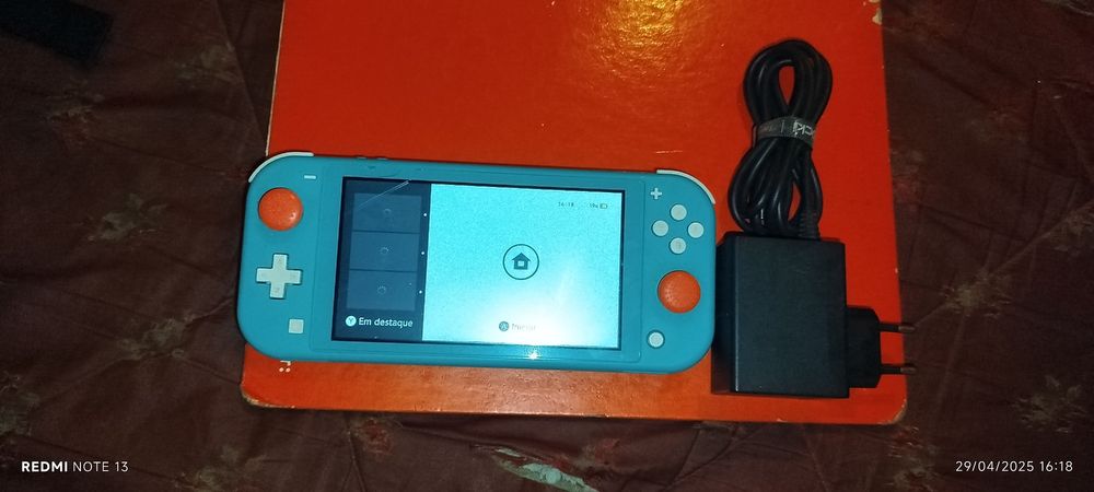 Vendo Nintendo Switch Lite azul bebé + bolsa de transporte.