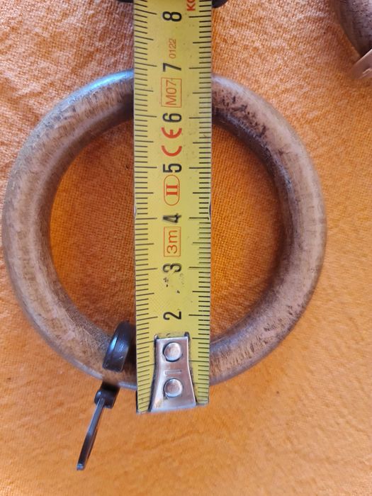 100 Argolas, topos e apoio central para varão 35mm madeira