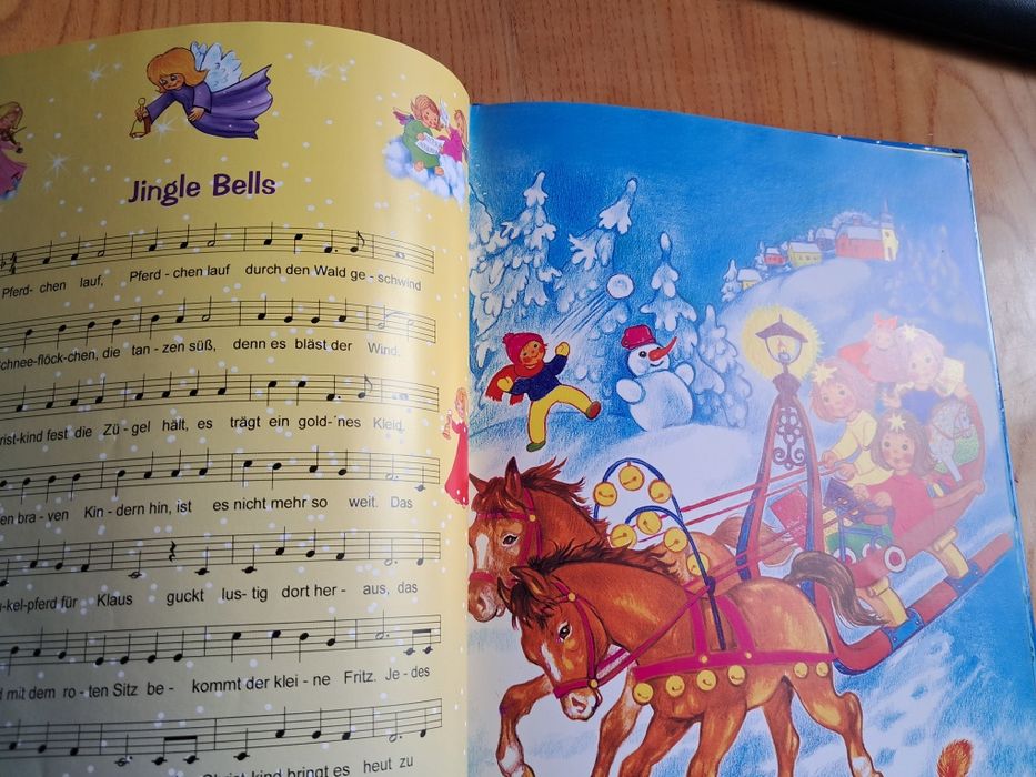 "Скоро Різдво", пісні, оповідки, книга німецькою для дітей