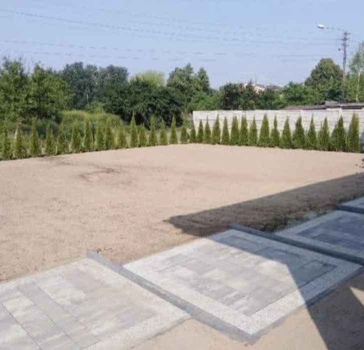 Oferuje usługi ogrodnicze