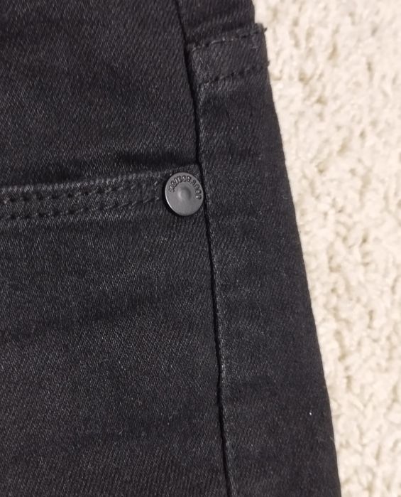 Czarne jeansy House L