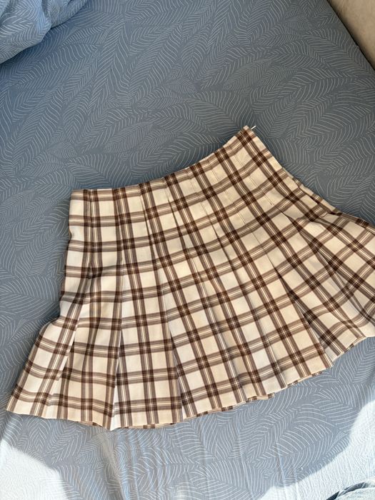 Бежева юбка у клітинку