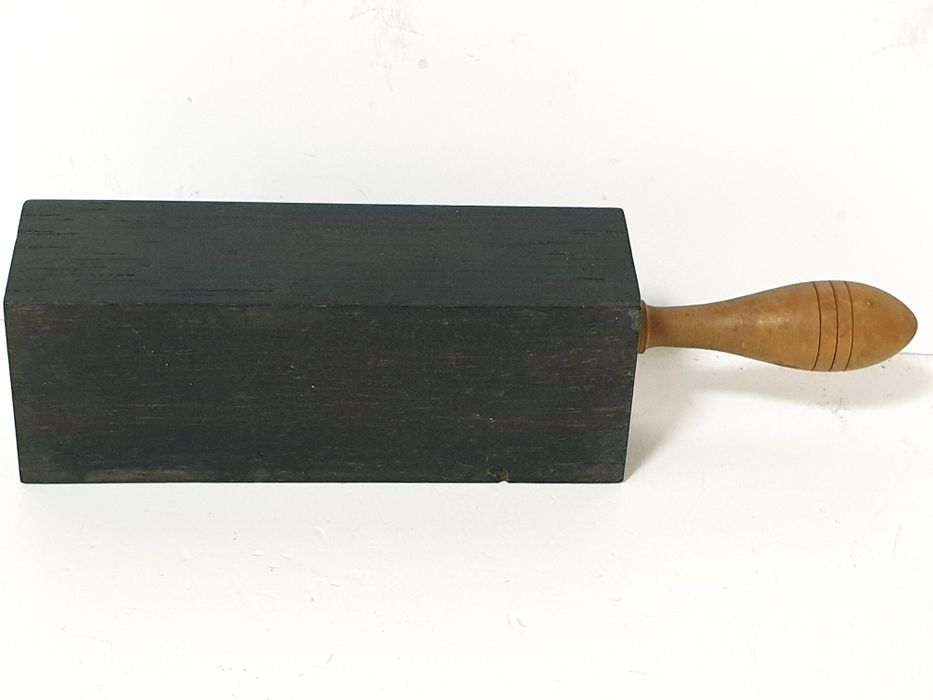 Antigo strop de escritório para afiar lápis