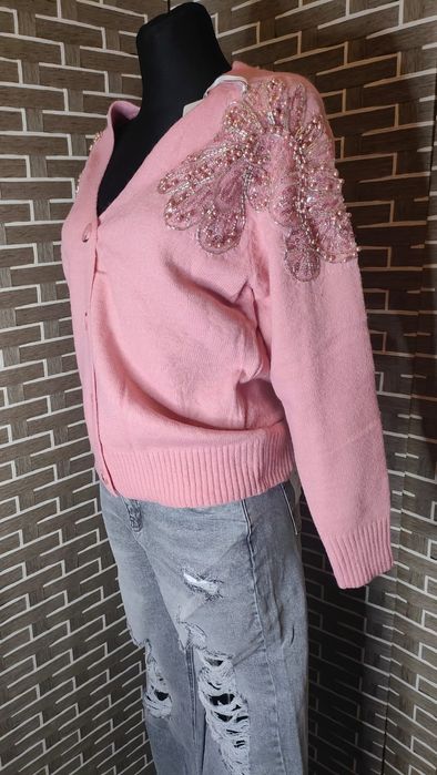 Różowy rozpinany sweterek