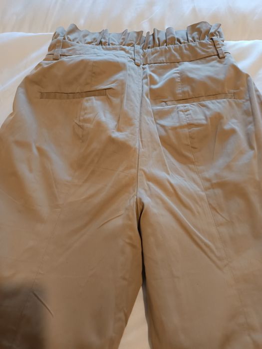 Calças de cinta subida para mulher