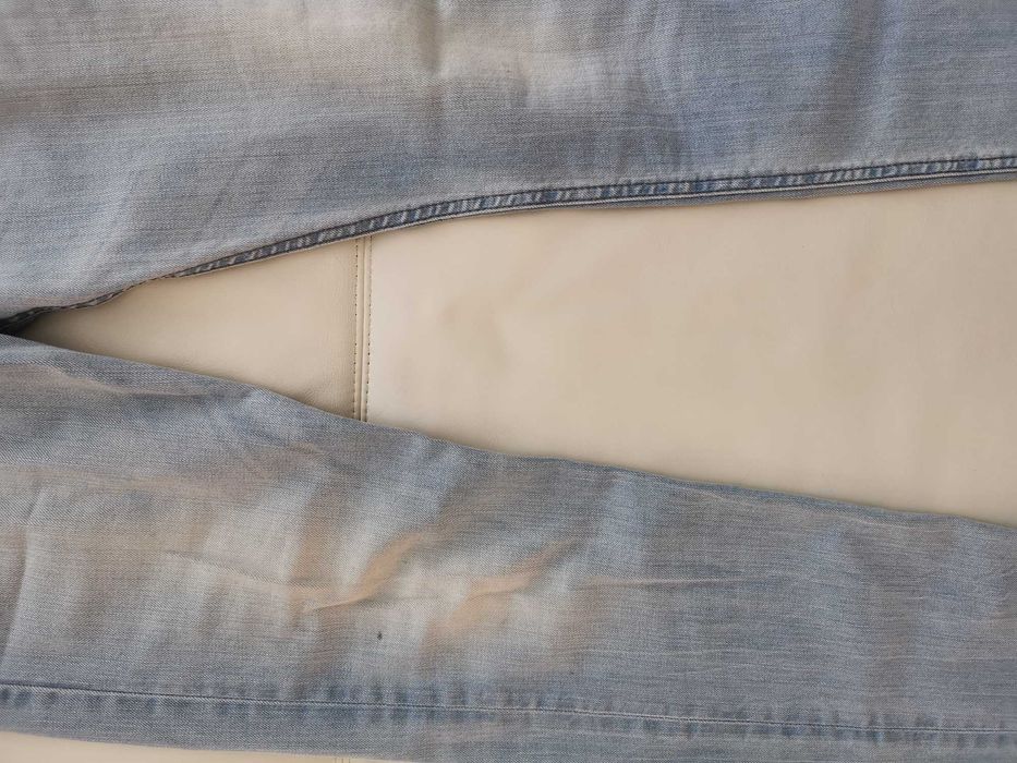 DIESEL spodnie jeansowe Model BELTHER  rozm. W 32 L 34 używane