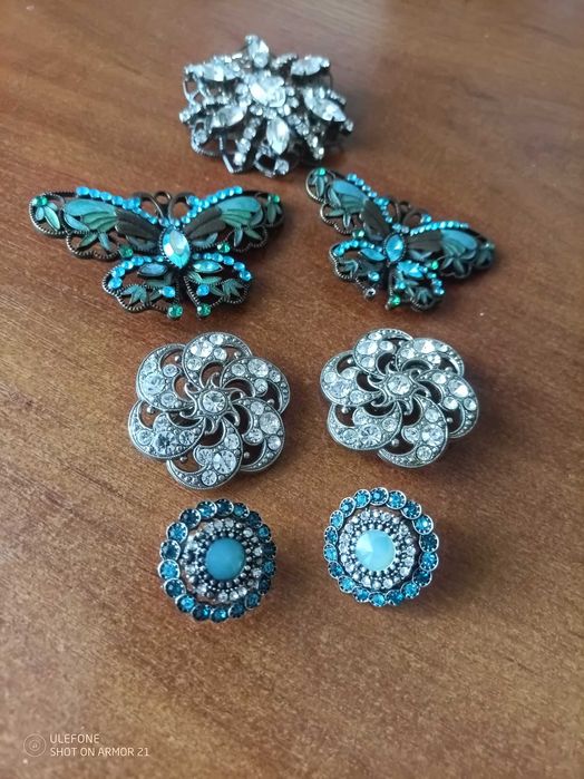 Антикварні брошки