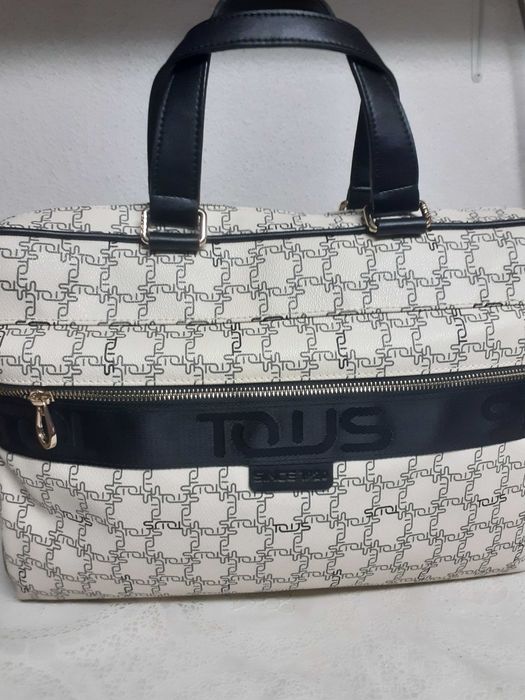 Mala senhora da Tous