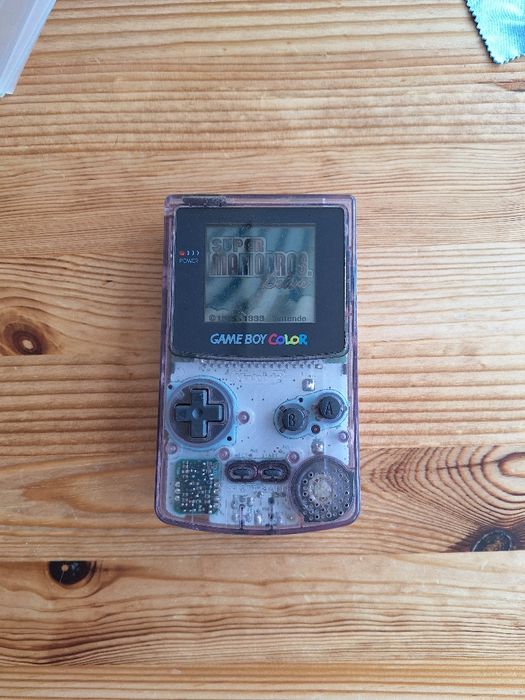 Gameboy roxo e jogo Harry Potter