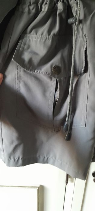 Parka ajustavel com bolsos gola alta