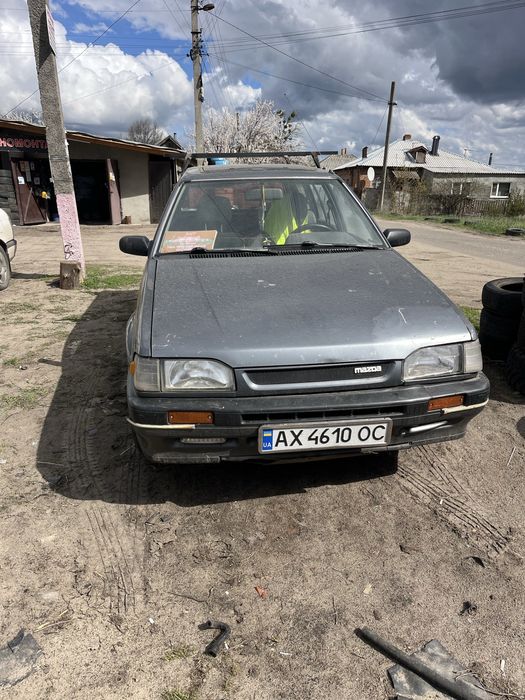 Мазда 323 1990 газ бензин ,переоформлення .