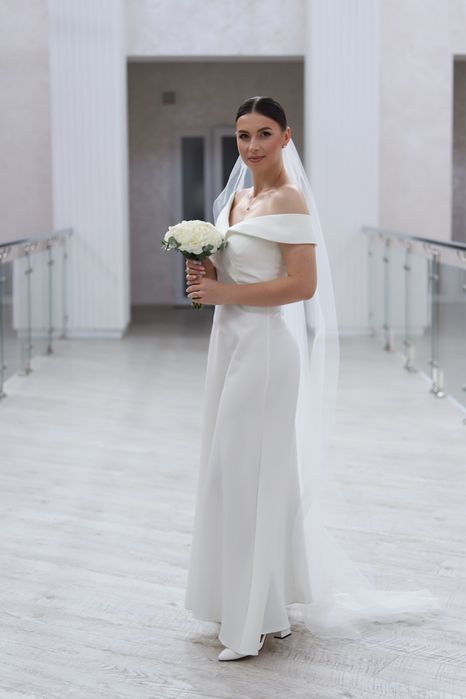 Розкішна весільна сукня