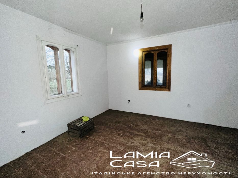 Продаж будиночка в Мигово з ділянкою